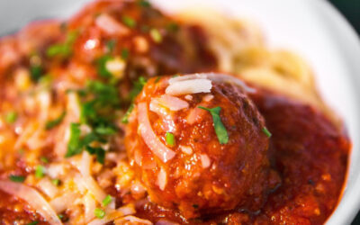 Pork meatballs in rich tomato and red pepper sauce